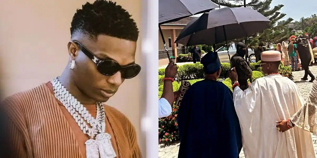 “A son that honours his father” – Fans hail Wizkid as he holds umbrella for his dad at mother’s funeral