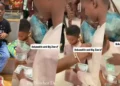 “Big bro duties” – Adorable moment Wizkid’s first son, Boluwatife sprays money on his junior brother, Zion