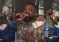 “Fowosere of Africa” – Wizkid makes it rain, sprays bundles of ₦500 notes as Kunle Afolayan hypes him, video wows many